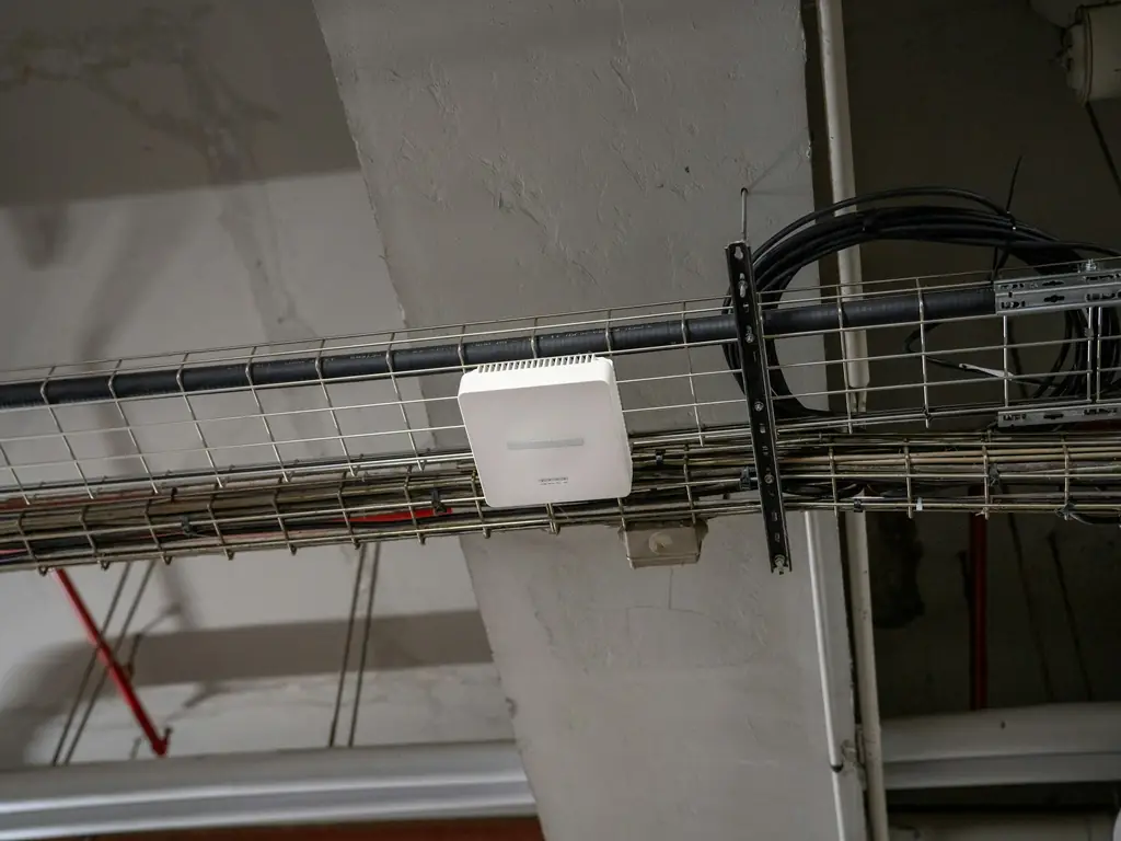 Wireless access point mounted on a ceiling cable tray