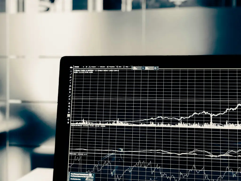 Monitor displaying live line graphs on a dark grid