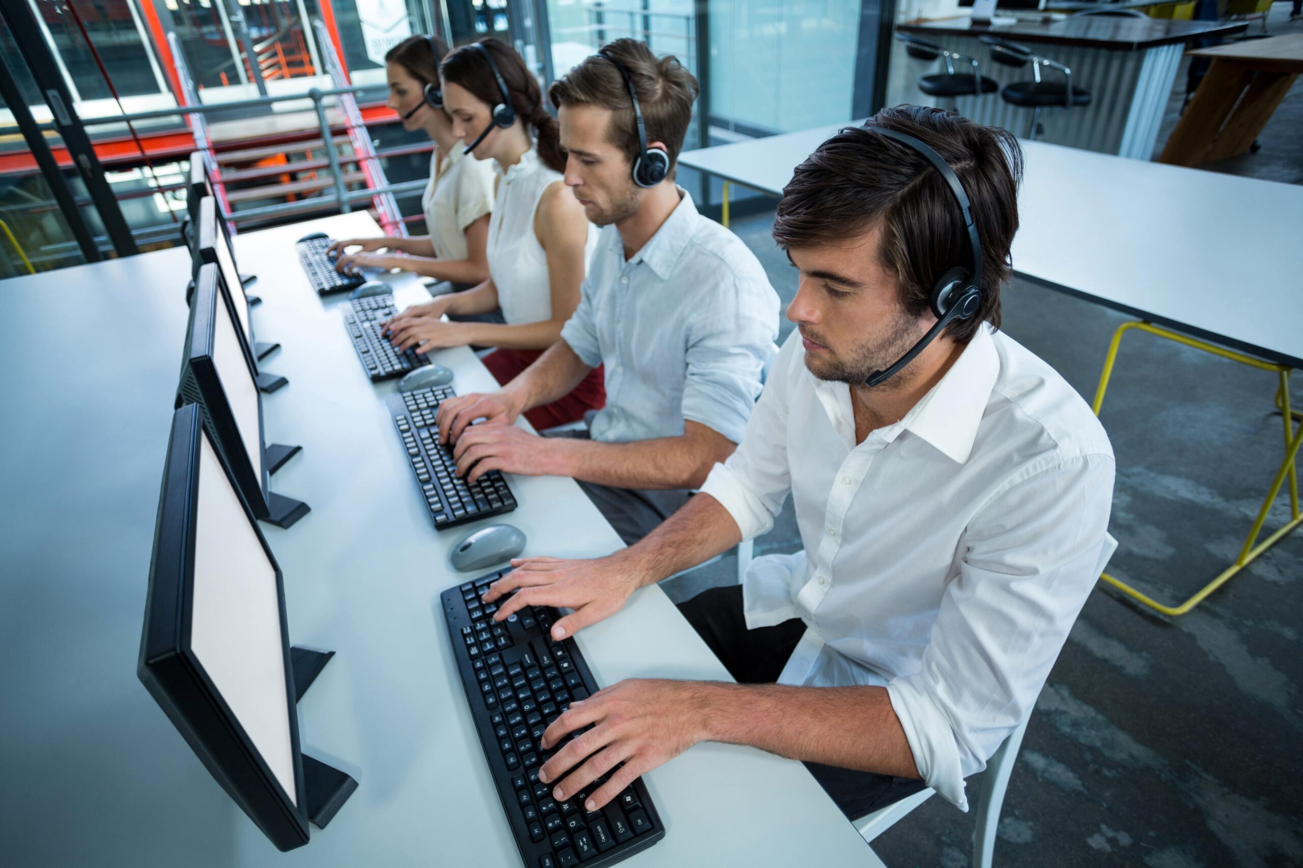 Group of managed IT services engineers working in an office