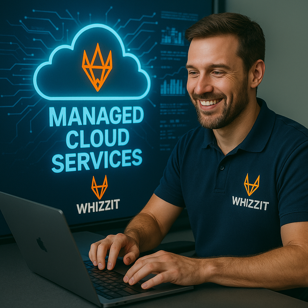 Man at a laptop performing managed cloud services