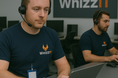 WhizzIT Staff Members performing Managed IT Services on computers